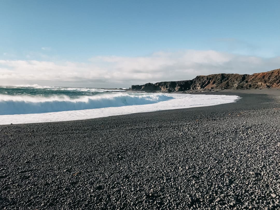 Enjoy the black sand beaches