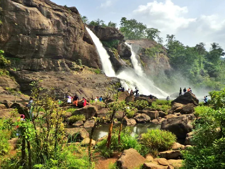 Marvel The Enchanting Athirapally Falls - 1