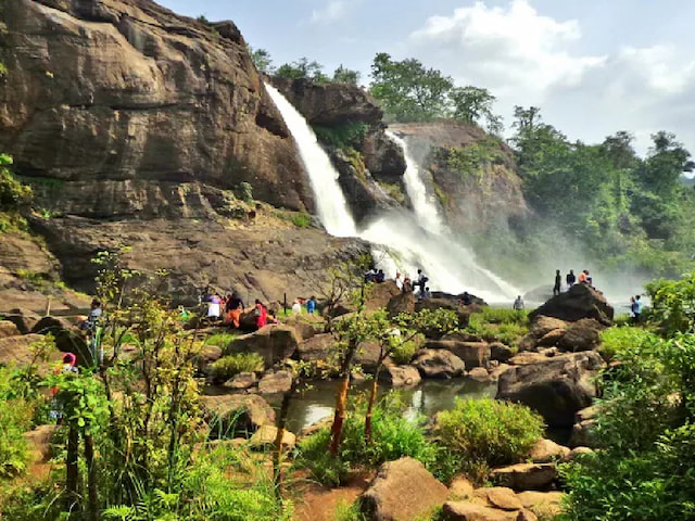 Marvel The Enchanting Athirapally Falls - 1