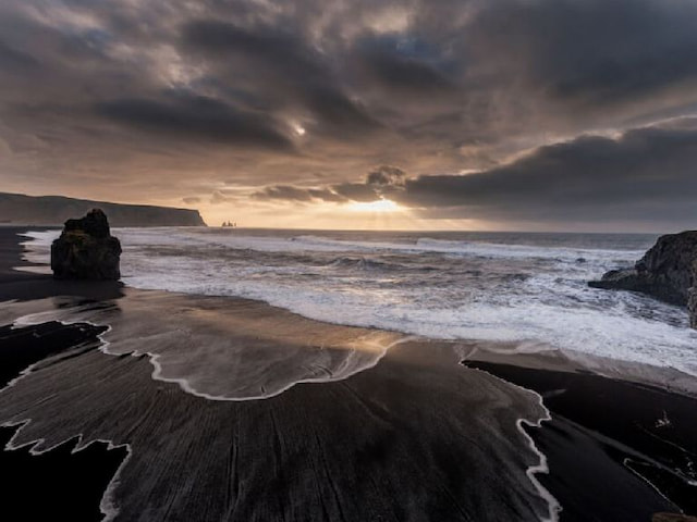 Enjoy the black sand beaches - 1