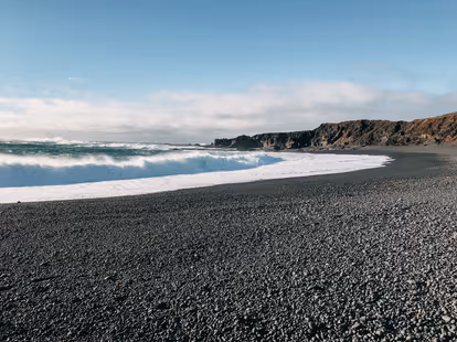 Enjoy the black sand beaches